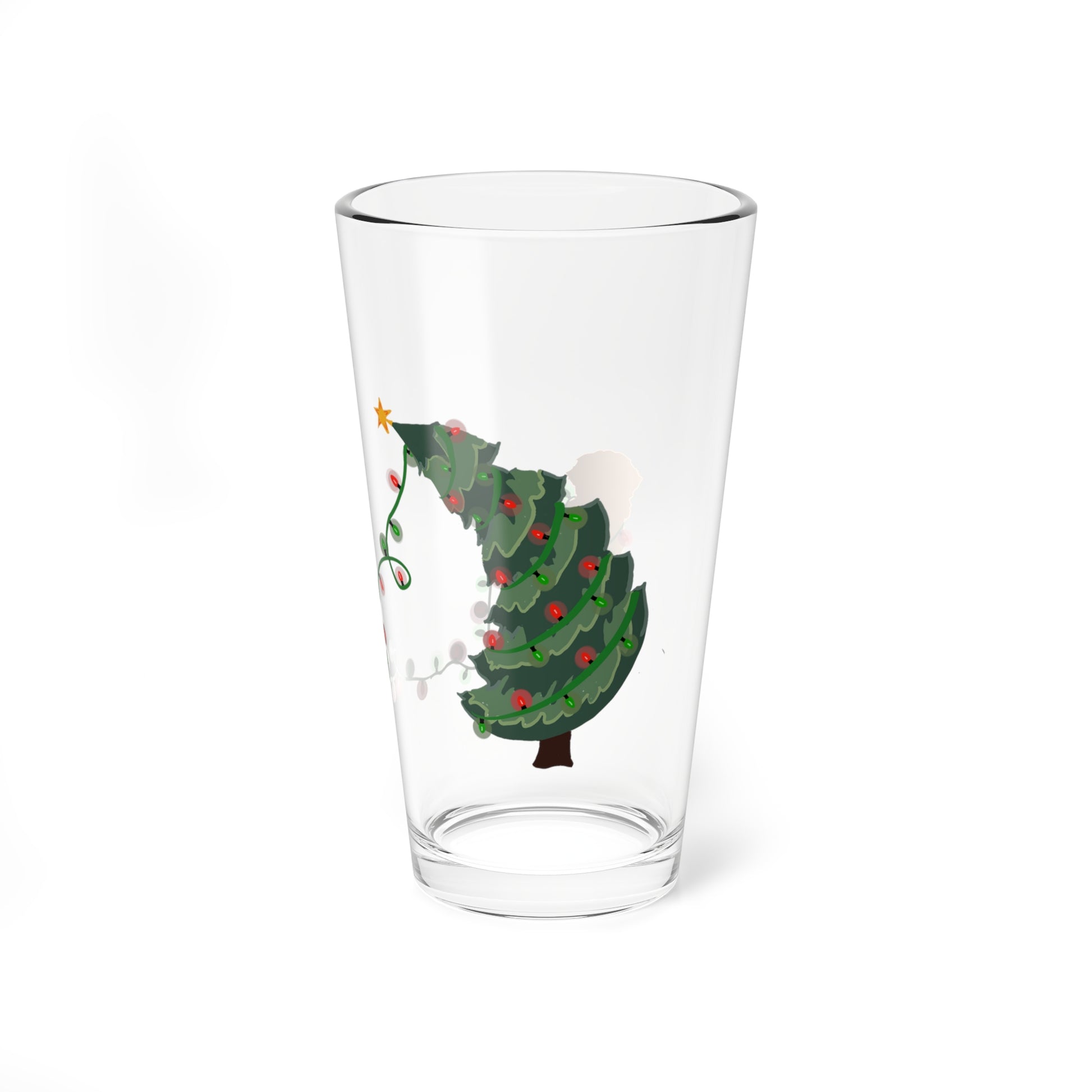 a glass with a christmas tree on it